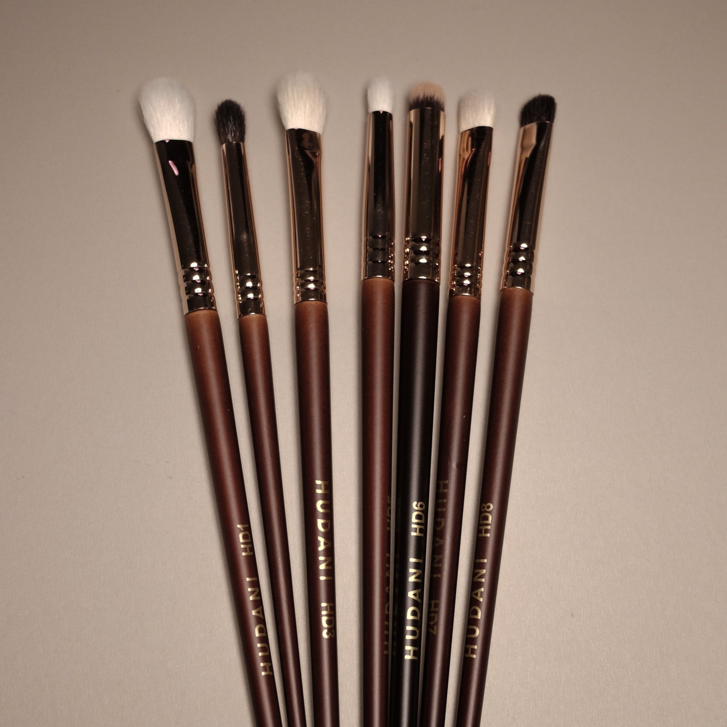 This is a natural haired blending brush and it has a wooden handle.